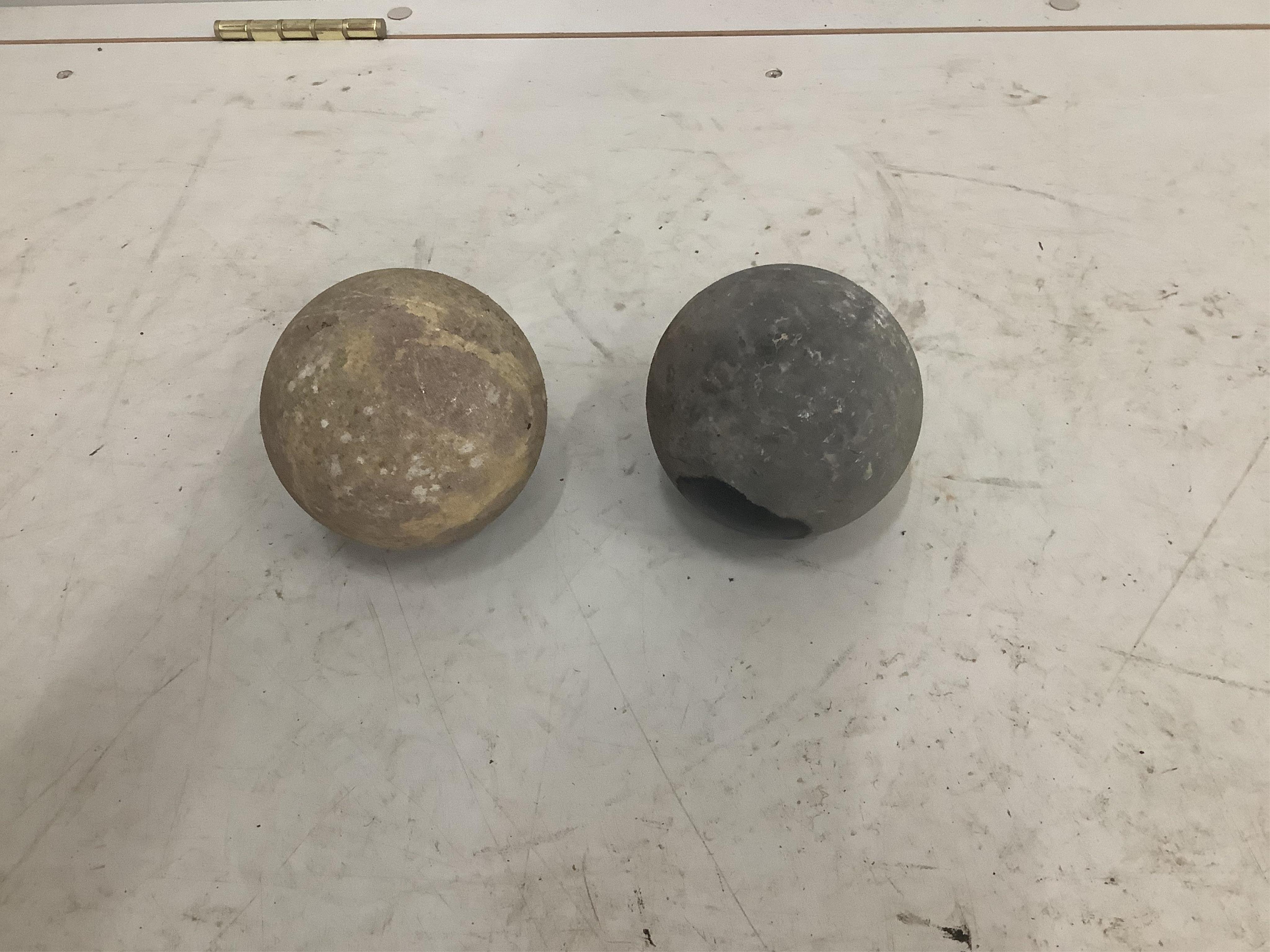 A white marble mortar, width 38cm, and two marble balls. Condition - all weathered, mortar with chips to the corners